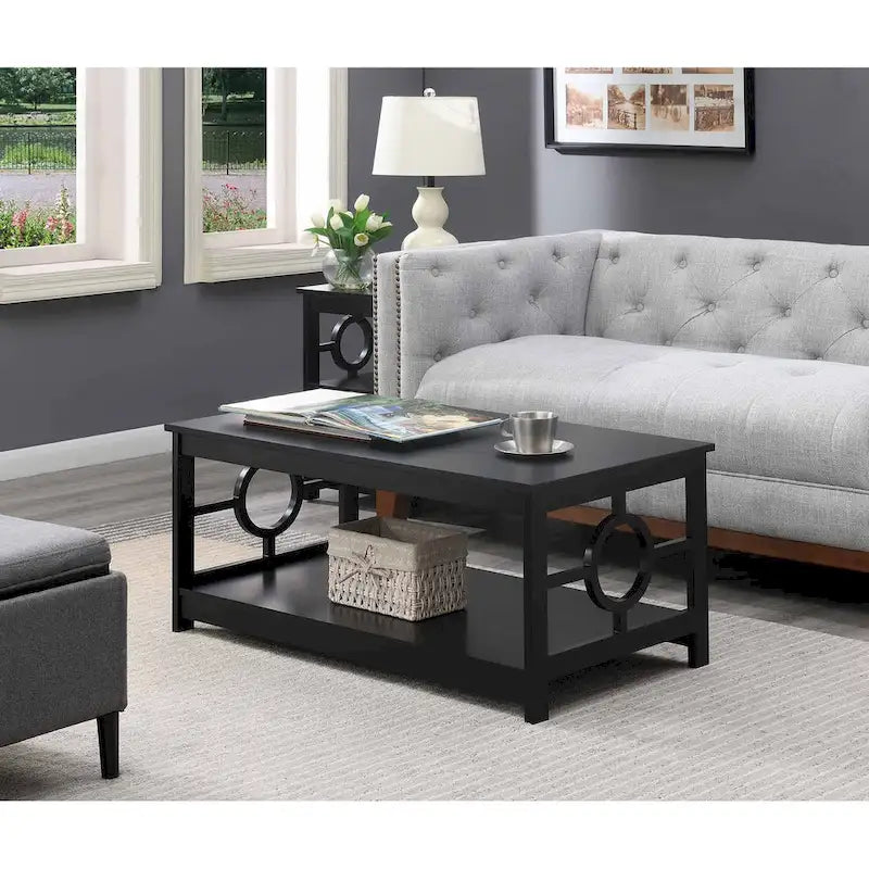 Table basse contemporaine avec cadre latéral en forme d'anneau et étagère inférieure