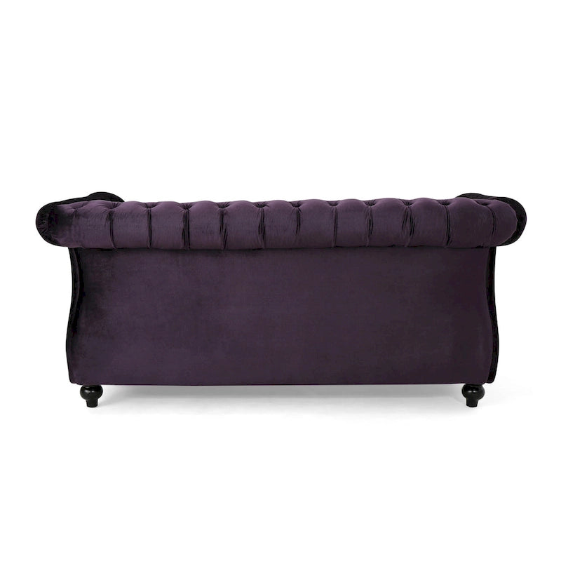 Causeuse Chesterfield capitonnée avec clous décoratifs