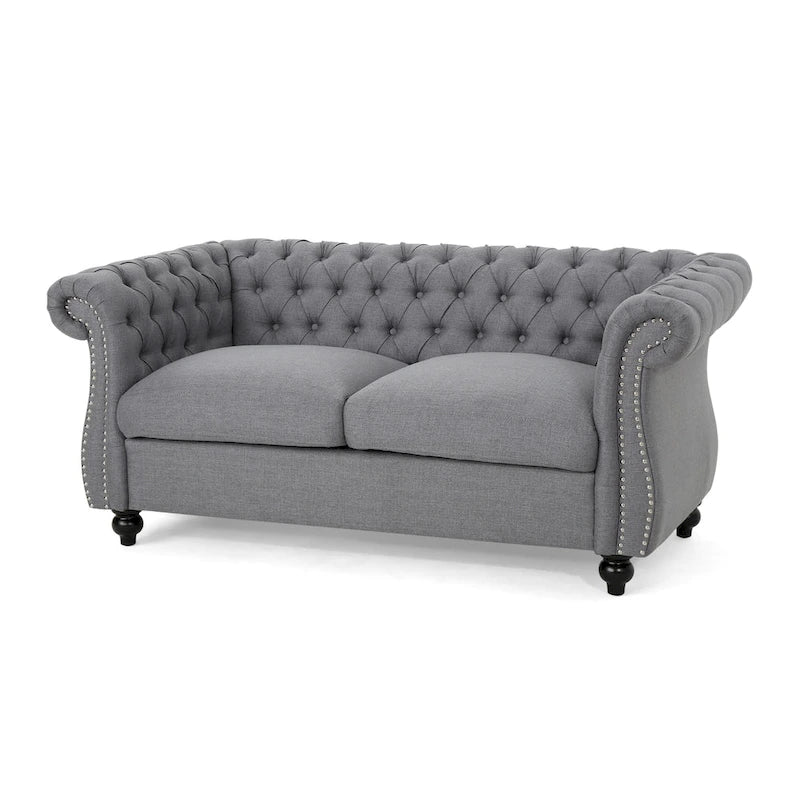 Causeuse Chesterfield capitonnée avec clous décoratifs