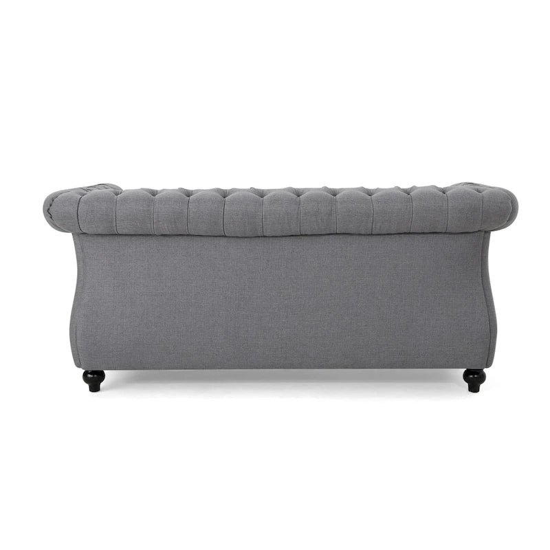 Causeuse Chesterfield capitonnée avec clous décoratifs