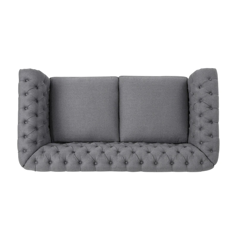 Causeuse Chesterfield capitonnée avec clous décoratifs