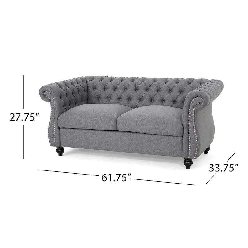Causeuse Chesterfield capitonnée avec clous décoratifs