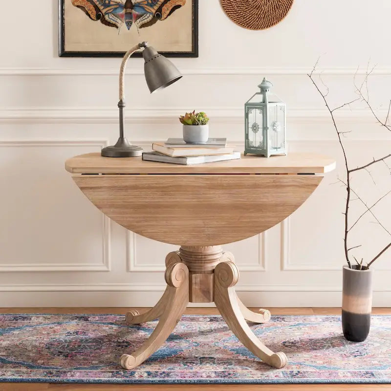 Table à manger à abattants avec pied central et détails sculptés en spirale, 43" x 31"