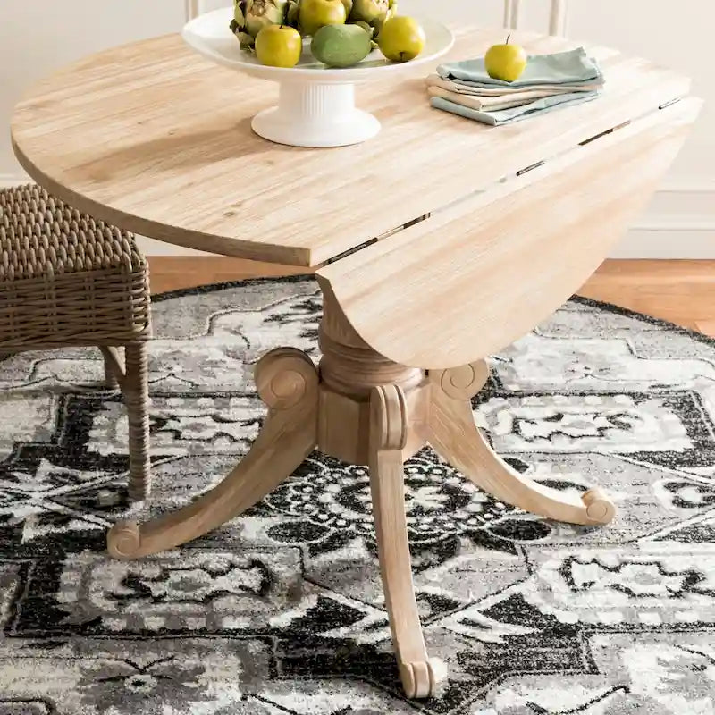 Table à manger à abattants avec pied central et détails sculptés en spirale, 43" x 31"